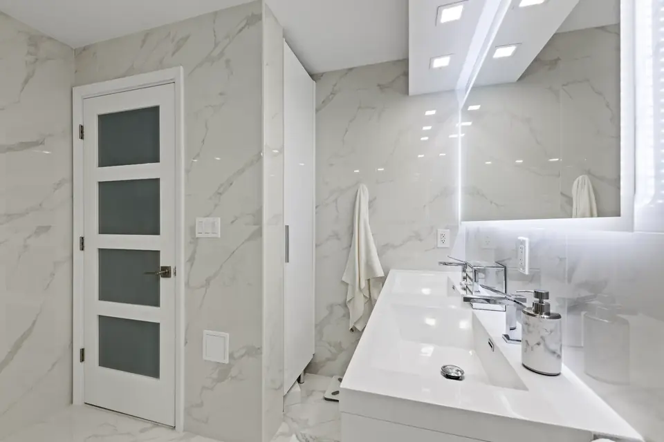 Finished bathroom with refined materials