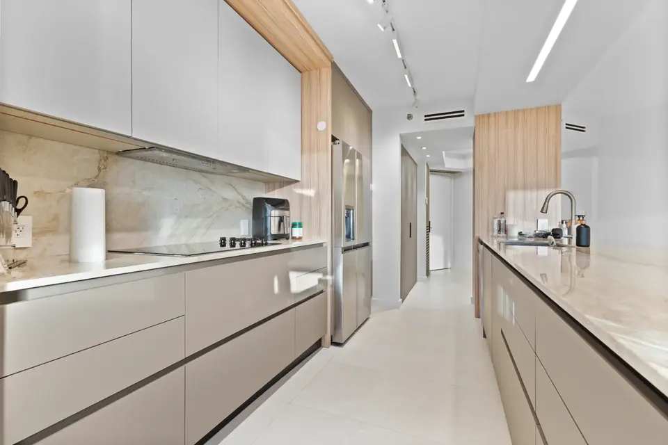 Finished kitchen with custom cabinetry